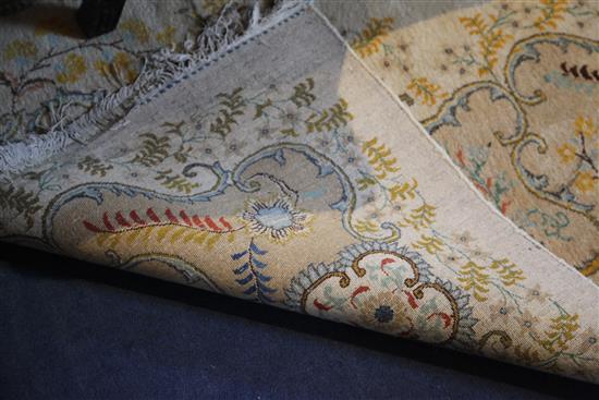 A Kashan cream ground five colour carpet, 15ft by 10ft 8in.